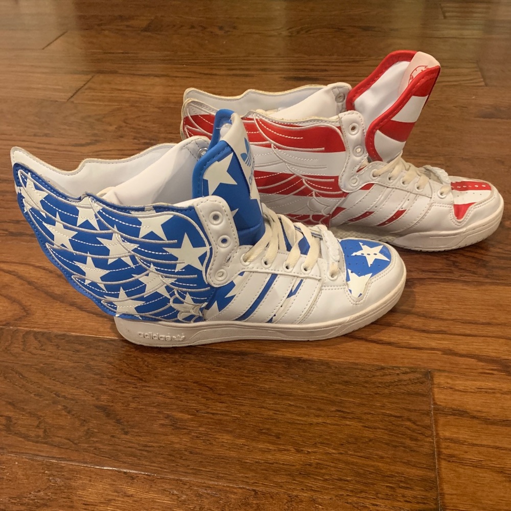 Red white and blue adidas by Jeremy Scott